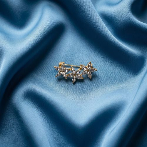 Gold-Tone Triple Flower Bar Brooch with Clear Marquise Crystals